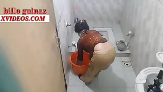 Indian girl taking a bath in exit c socialize