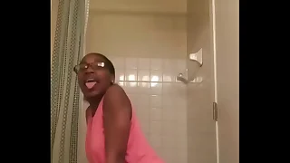 Chapfallen girl with glasses twerking
