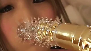 Goodlooking  Japanese  Asami Kubota toying the brush pussy