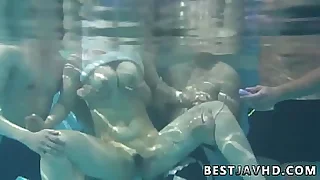Suzuna Komiya the nastiest Asian woman gives fellatio by the pool in the greatest Japanese group fuckathon scene
